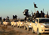 Isis fighters, pictured on a militant website verified by AP.